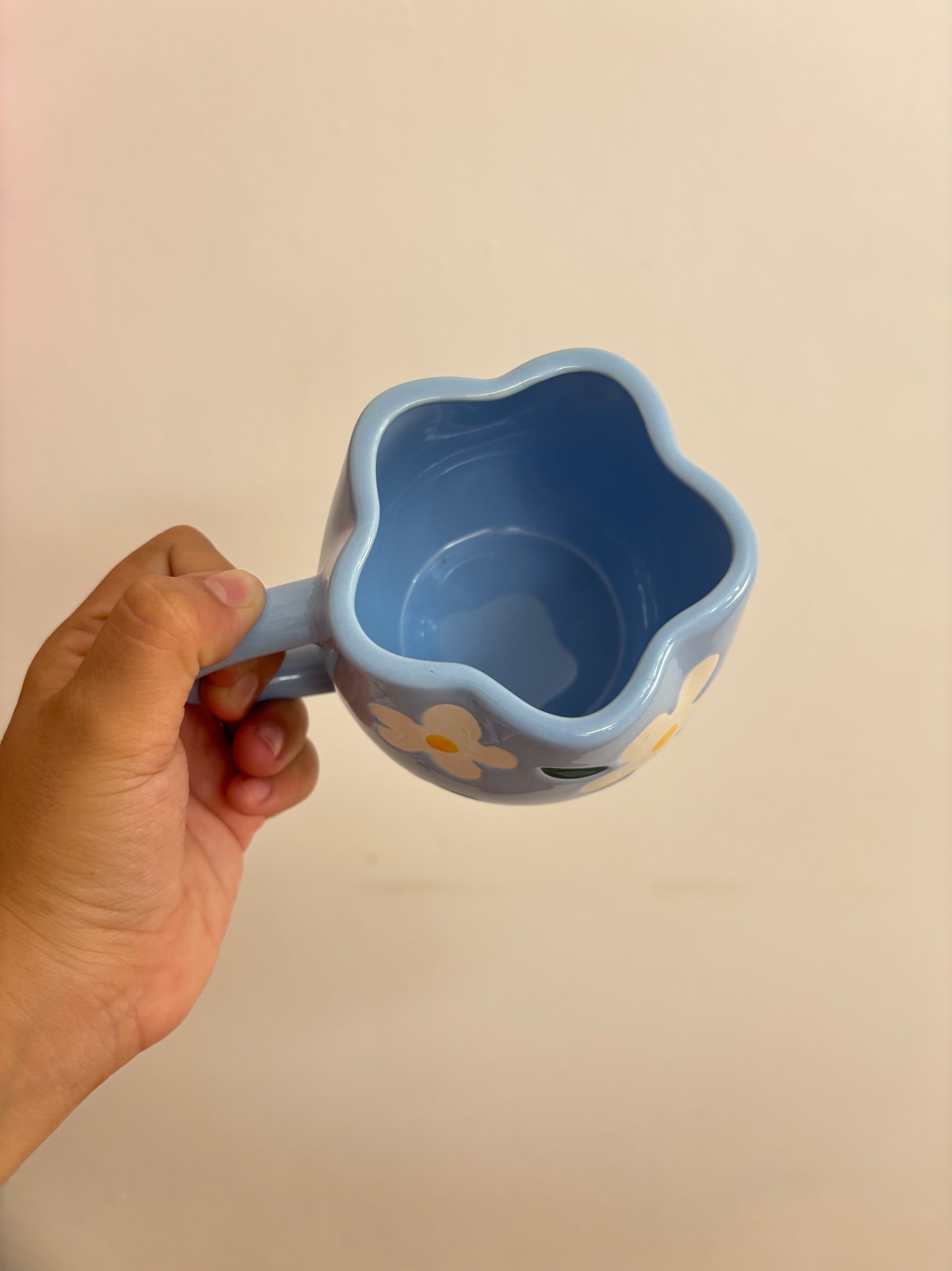 Taza celeste de flor