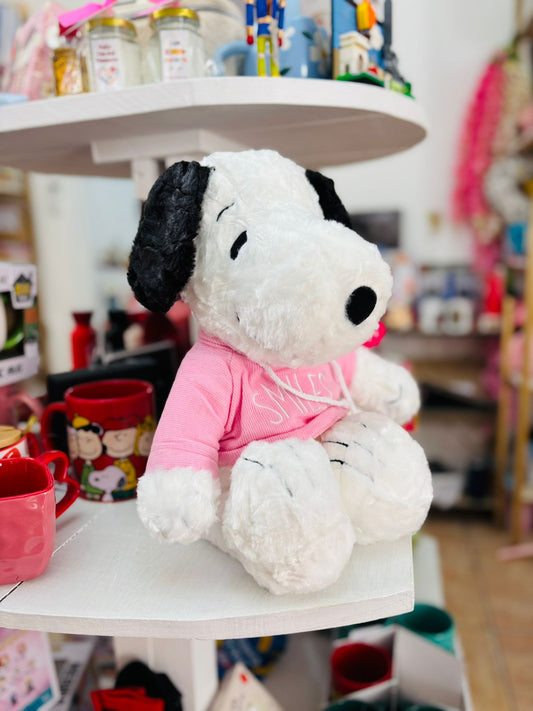 Peluche Snoopy con suéter rosa