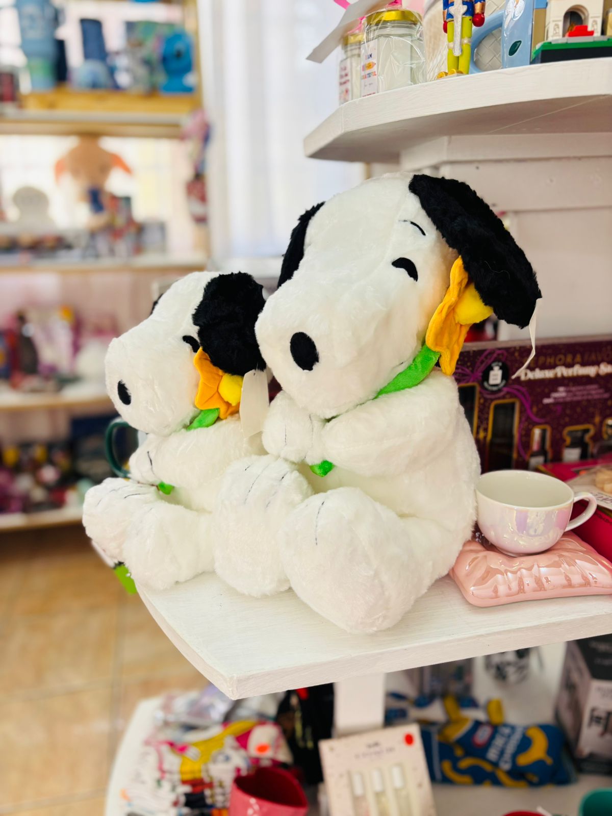 Peluche Snoopy con flor